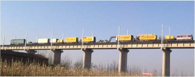 瓦日鐵路跨長(zhǎng)晉高速公路特大橋聚氨酯固化道床施工